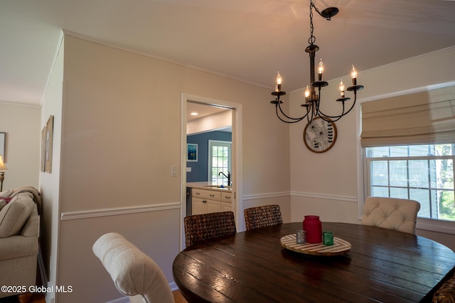 95 Jordan Blvd, Bethlehem, NY 12054 - dining room featuring a chandelier, plenty of natural light, and ornamental molding