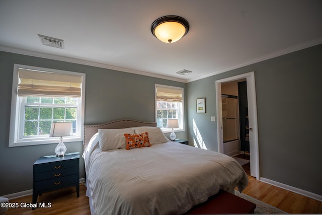 95 Jordan Blvd, Bethlehem, NY 12054 - bedroom featuring ornamental molding, wood finished floors, and baseboards