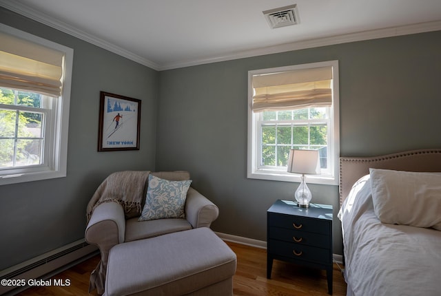 95 Jordan Blvd, Bethlehem, NY 12054 - bedroom featuring baseboard heating, wood finished floors, crown molding, and baseboards