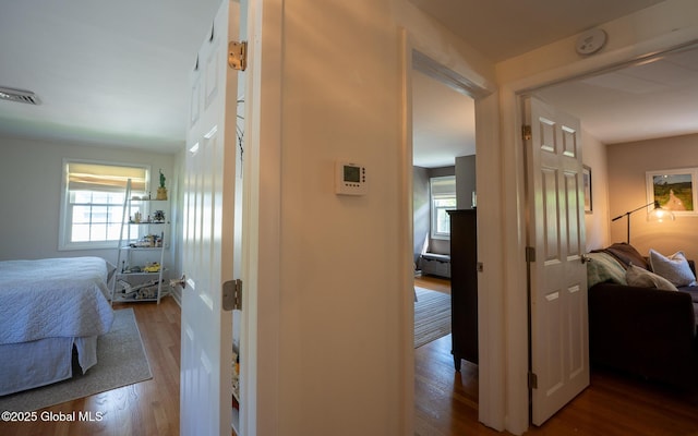 95 Jordan Blvd, Bethlehem, NY 12054 - hallway featuring plenty of natural light and wood finished floors