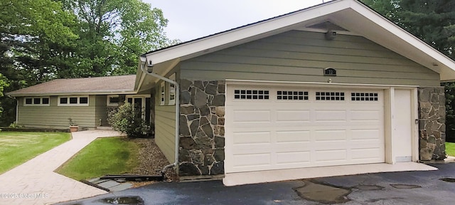 22 E Rd, Brunswick, NY 12180 - view of front of home with stone siding and asphalt driveway