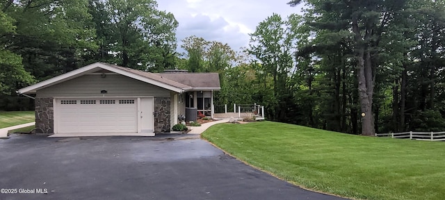 22 E Rd, Brunswick, NY 12180 - view of front facade featuring stone siding, driveway, and an attached garage