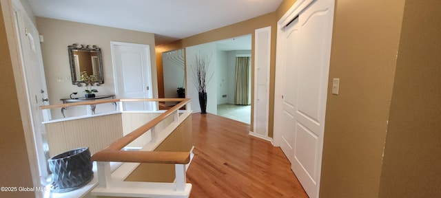 22 E Rd, Brunswick, NY 12180 - corridor with light wood-type flooring and an upstairs landing