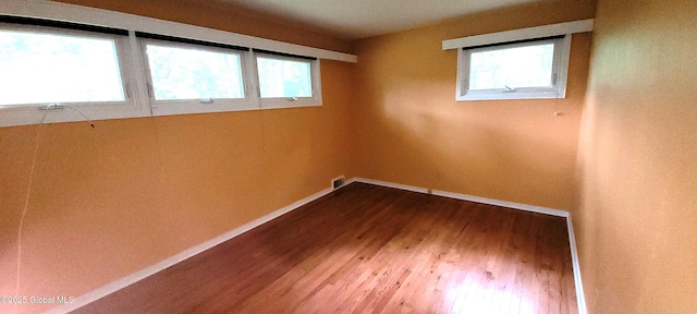 22 E Rd, Brunswick, NY 12180 - empty room featuring baseboards and wood finished floors