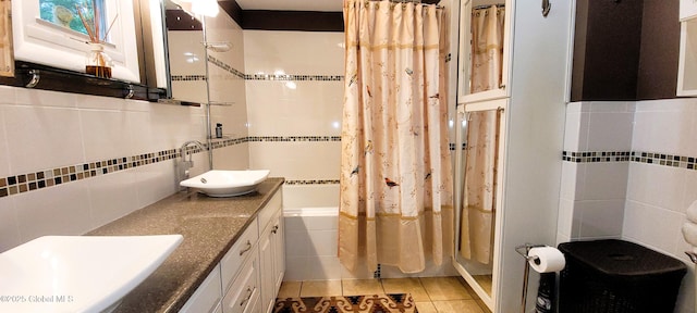 22 E Rd, Brunswick, NY 12180 - full bathroom featuring tile walls, double vanity, tile patterned floors, and shower / bathtub combination with curtain