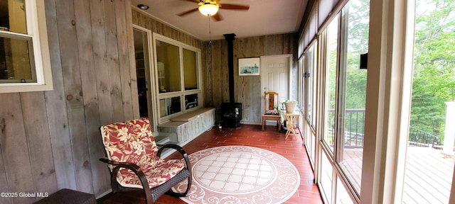 22 E Rd, Brunswick, NY 12180 - sunroom / solarium with a wood stove and wooden walls