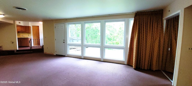 22 E Rd, Brunswick, NY 12180 - unfurnished living room featuring carpet flooring