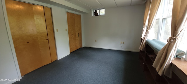 22 E Rd, Brunswick, NY 12180 - unfurnished bedroom with a drop ceiling and two closets