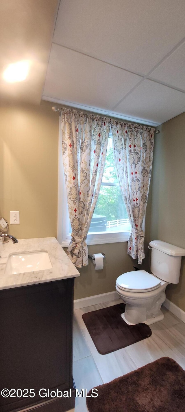 22 E Rd, Brunswick, NY 12180 - bathroom with toilet, vanity, and baseboards