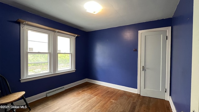 209 Hudson Ave E, East Greenbush, NY 12144 - empty room featuring wood finished floors and baseboards