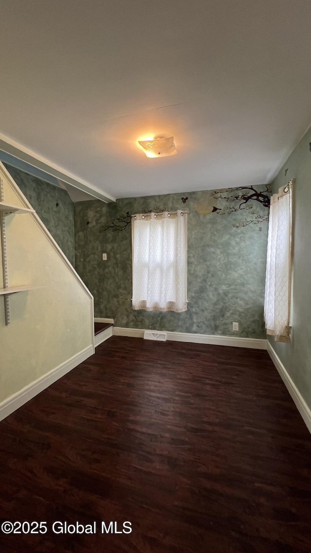209 Hudson Ave E, East Greenbush, NY 12144 - unfurnished living room featuring baseboards and dark wood-type flooring