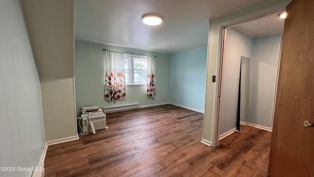 209 Hudson Ave E, East Greenbush, NY 12144 - unfurnished room featuring a baseboard radiator, wood finished floors, and baseboards