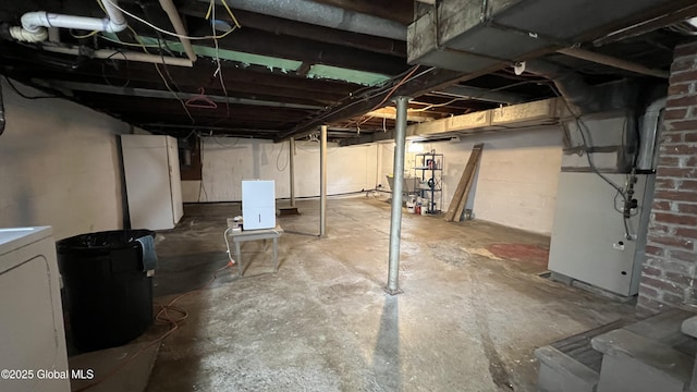 209 Hudson Ave E, East Greenbush, NY 12144 - unfinished below grade area with heating unit and washer / dryer