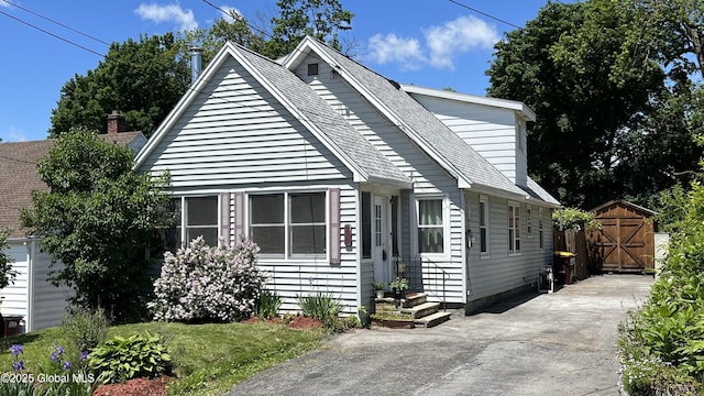 209 Hudson Ave E, East Greenbush, NY 12144 - bungalow featuring roof with shingles
