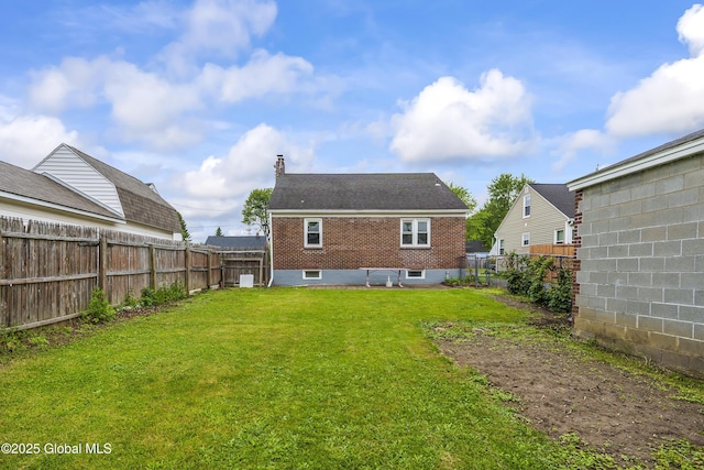 5 Brigadier St, Colonie, NY 12205 - back of house featuring brick siding and a chimney