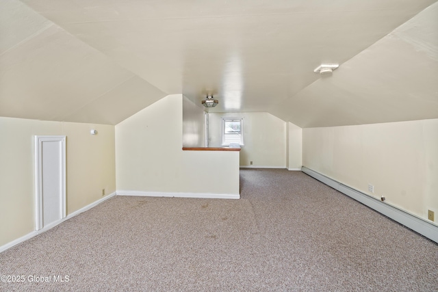 5 Brigadier St, Colonie, NY 12205 - additional living space featuring carpet, lofted ceiling, a baseboard radiator, and baseboards
