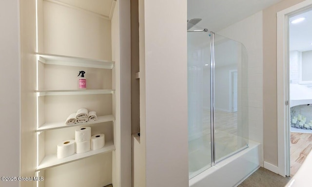 3956 Rte 9 W, Saugerties, NY 12477 - bathroom with shower / bath combination with glass door and built in shelves