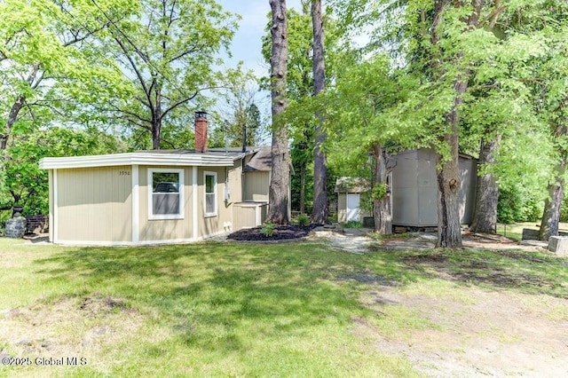 3956 Rte 9 W, Saugerties, NY 12477 - view of front of property featuring a chimney and a front yard