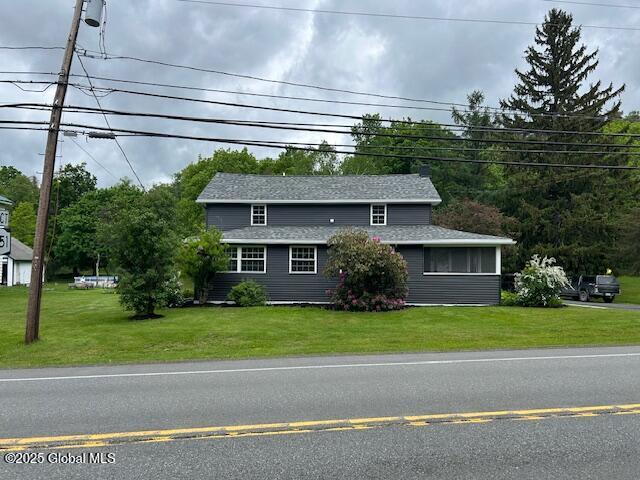 3916 State Highway 2, Brunswick, NY 12180 - traditional-style house with a front yard and a shingled roof
