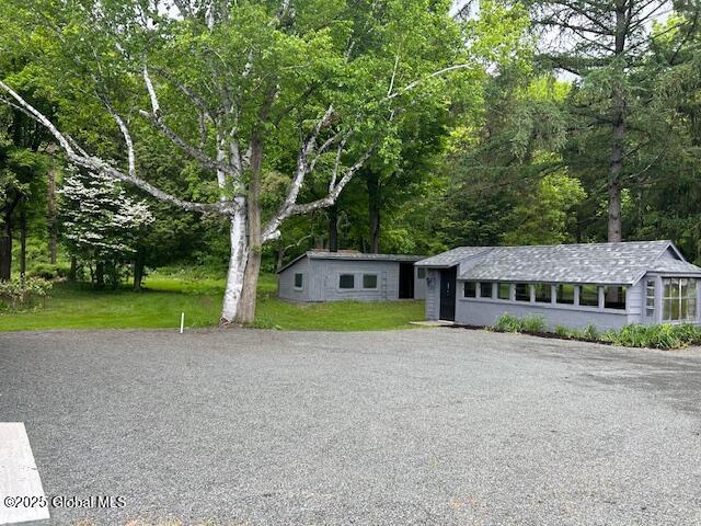 3916 State Highway 2, Brunswick, NY 12180 - view of front of house with a front lawn and driveway