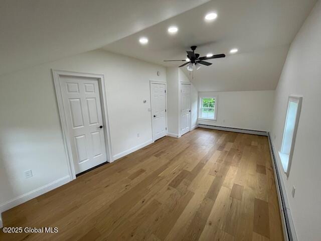 3916 State Highway 2, Brunswick, NY 12180 - bonus room featuring vaulted ceiling, baseboard heating, a ceiling fan, light wood finished floors, and baseboards