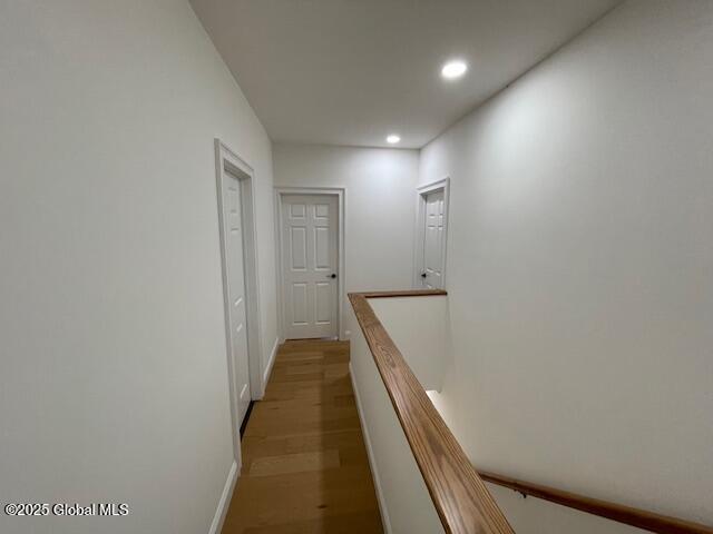 3916 State Highway 2, Brunswick, NY 12180 - corridor with recessed lighting, an upstairs landing, and light wood-style floors