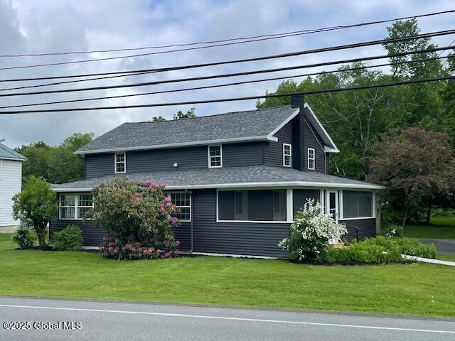 3916 State Highway 2, Brunswick, NY 12180 - farmhouse with a front yard