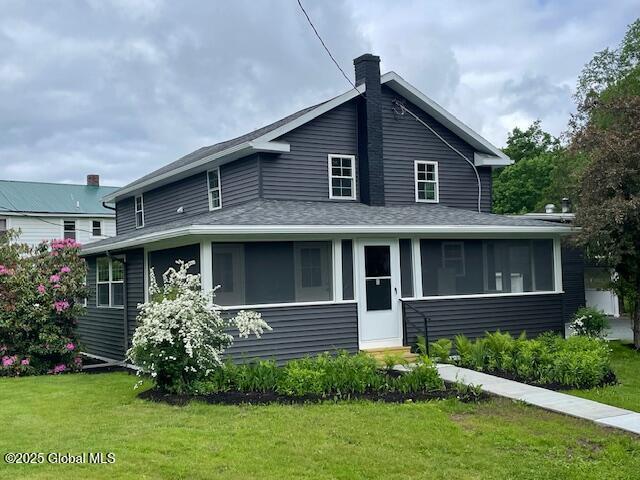 3916 State Highway 2, Brunswick, NY 12180 - rear view of property with a lawn, a chimney, and roof with shingles