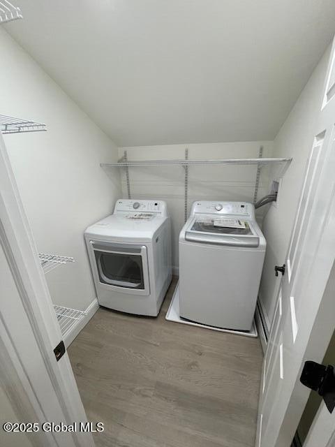 3916 State Highway 2, Brunswick, NY 12180 - laundry area featuring independent washer and dryer and wood finished floors