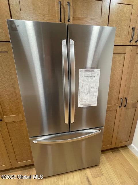 3916 State Highway 2, Brunswick, NY 12180 - kitchen view of freestanding refrigerator and light wood-type flooring