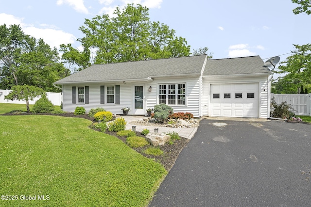 11 Thatcher Dr, Altamont, NY 12009 - view of front facade featuring an attached garage, driveway, and roof with shingles