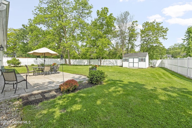 11 Thatcher Dr, Altamont, NY 12009 - fenced backyard with a patio and a storage unit