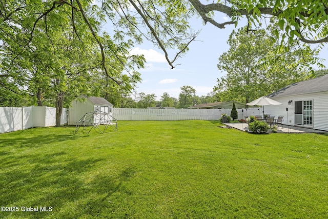 11 Thatcher Dr, Altamont, NY 12009 - fenced backyard featuring a patio and a storage unit