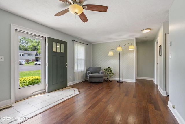 11 Thatcher Dr, Altamont, NY 12009 - entryway with wood-type flooring, a textured ceiling, and a ceiling fan