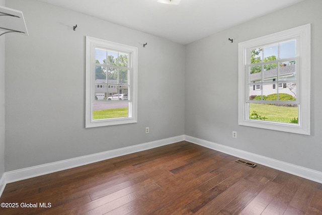 11 Thatcher Dr, Altamont, NY 12009 - empty room featuring dark wood-style floors and baseboards