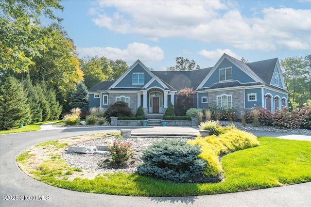 18 Rose Ter, Wilton, NY 12866 - view of front facade featuring stone siding