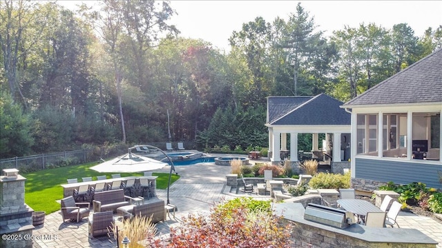 18 Rose Ter, Wilton, NY 12866 - view of patio featuring a pool with connected hot tub, outdoor dining space, a sunroom, and outdoor lounge area