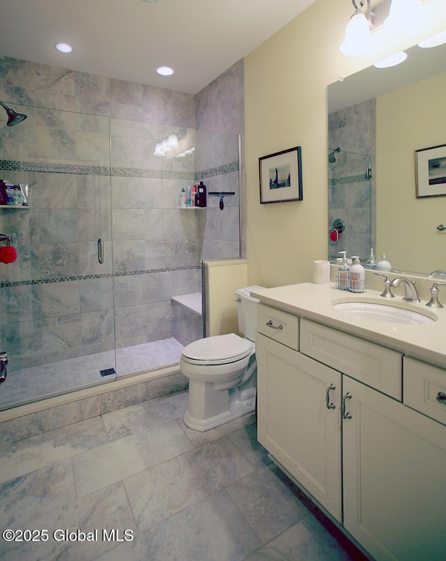 18 Rose Ter, Wilton, NY 12866 - bathroom featuring vanity, a stall shower, toilet, and recessed lighting