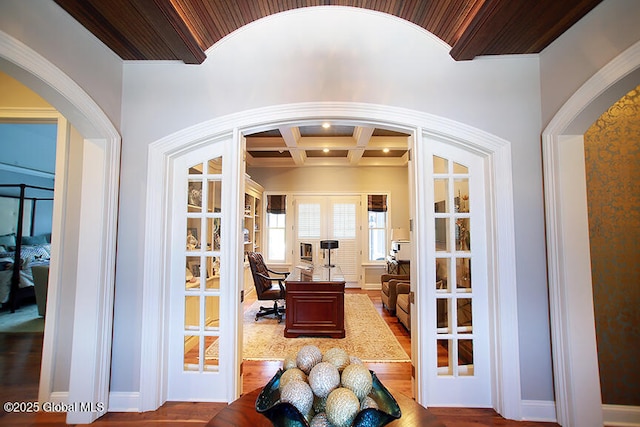 18 Rose Ter, Wilton, NY 12866 - foyer entrance featuring arched walkways, coffered ceiling, wood finished floors, french doors, and beamed ceiling