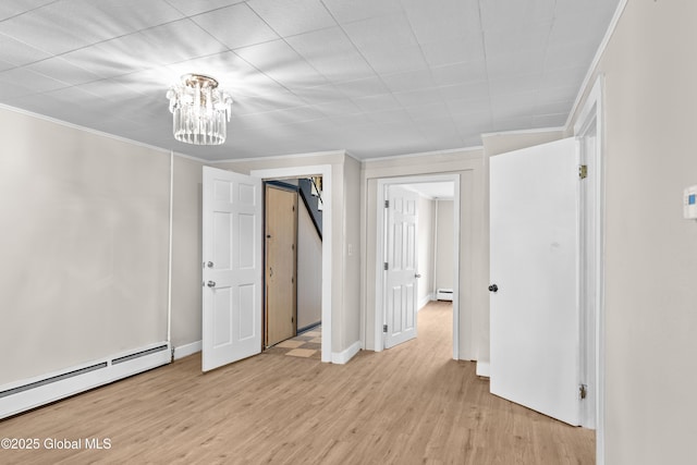 819 1st St, Rensselaer, NY 12144 - unfurnished bedroom with a baseboard radiator, light wood finished floors, a chandelier, ornamental molding, and baseboard heating