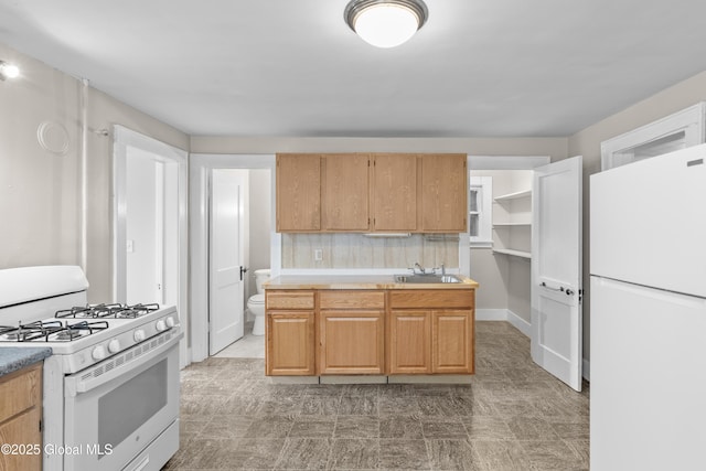 819 1st St, Rensselaer, NY 12144 - kitchen with white appliances and a sink