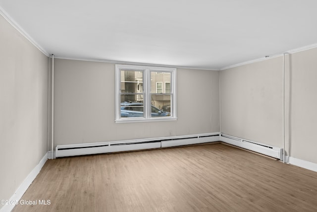 819 1st St, Rensselaer, NY 12144 - empty room featuring wood finished floors, ornamental molding, and baseboards