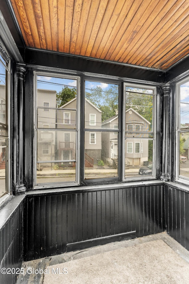 819 1st St, Rensselaer, NY 12144 - unfurnished sunroom with wooden ceiling