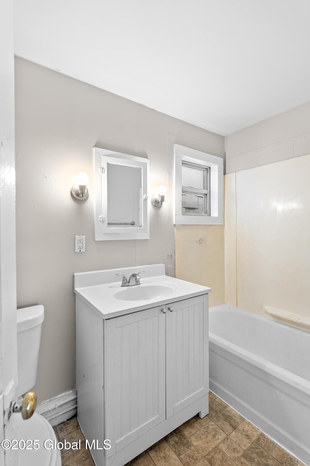 819 1st St, Rensselaer, NY 12144 - bathroom featuring toilet and vanity