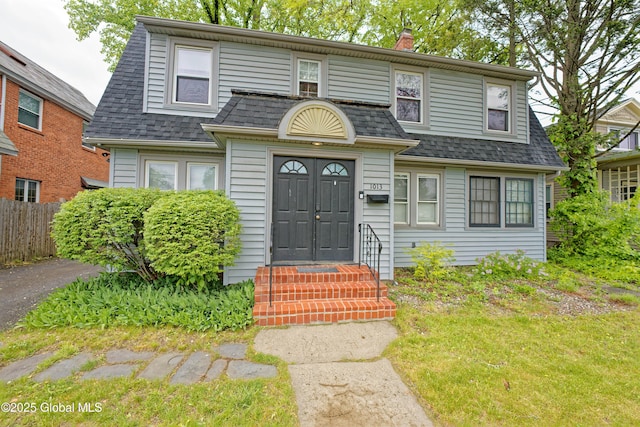 1013 Washington Ave, Albany, NY 12206 - colonial inspired home with a shingled roof and a chimney