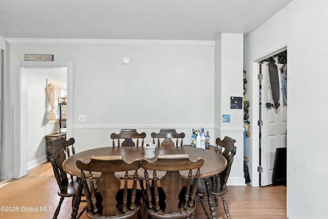 1022 State Route 29, Greenwich, NY 12834 - dining space with light wood-style floors, crown molding, and baseboards