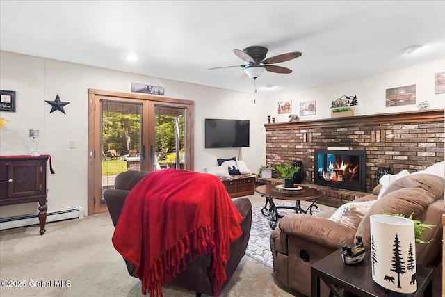 617 Cindy Ln, Ballston, NY 12020 - carpeted living area featuring french doors, ceiling fan, a fireplace, and baseboard heating
