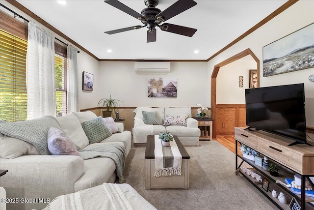 617 Cindy Ln, Ballston, NY 12020 - living area with a wall mounted air conditioner, crown molding, wainscoting, ceiling fan, and recessed lighting