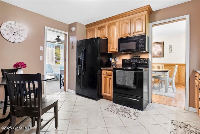 617 Cindy Ln, Ballston, NY 12020 - kitchen with black appliances, light tile patterned flooring, and a ceiling fan