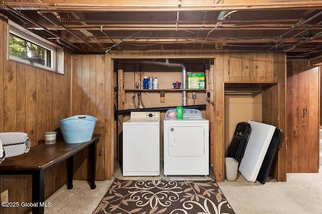 617 Cindy Ln, Ballston, NY 12020 - washroom with washing machine and clothes dryer and wooden walls